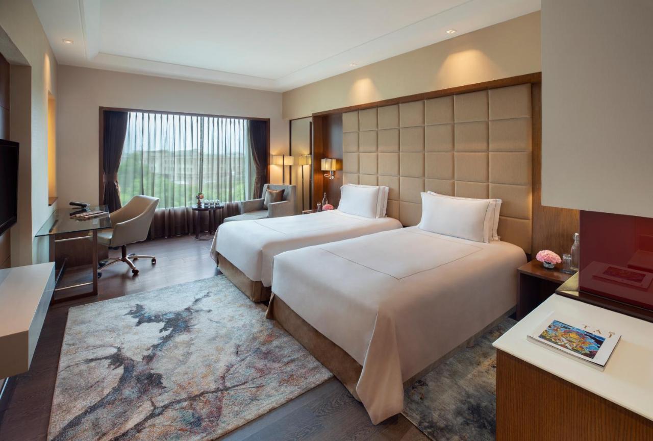Taj Club Room Twin Bed with 15% discount on food, beverages, laundry and spa