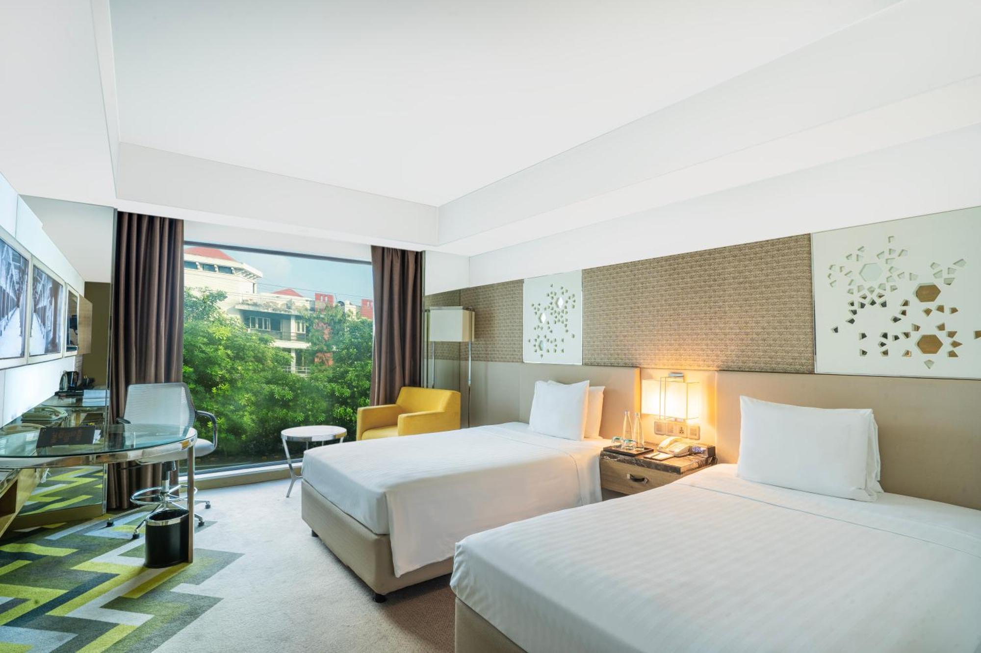 Deluxe Twin Room Enjoy INR 750 F&B Credit, 15% off Spa, Early check-in Late check-out (Subject to availability)